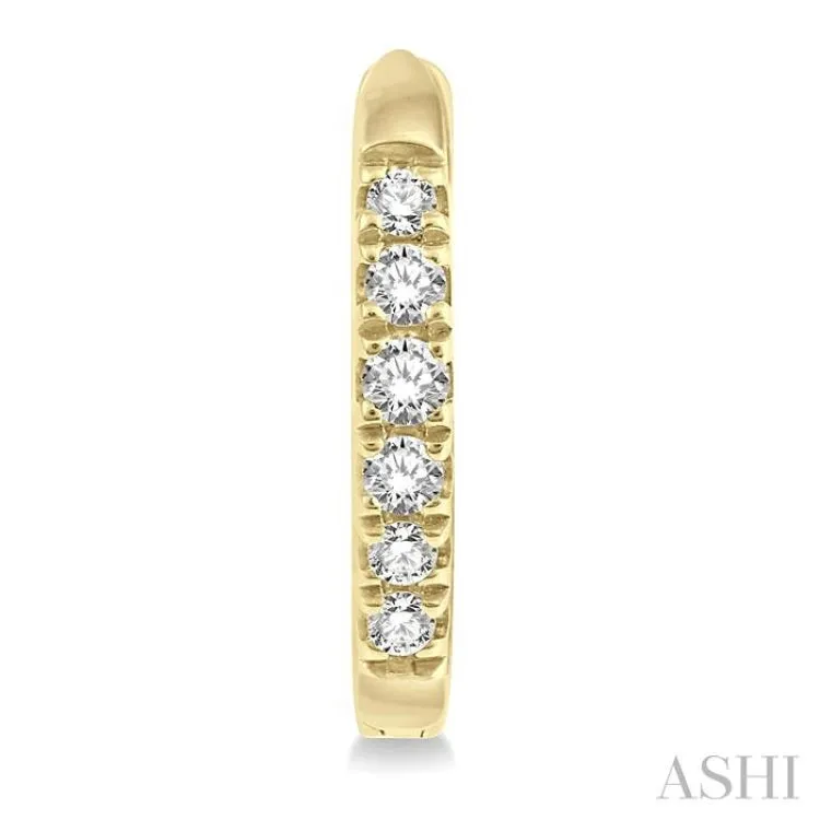 1/8 ctw Round Cut Diamond Huggie Petite Earrings in 10K Yellow Gold