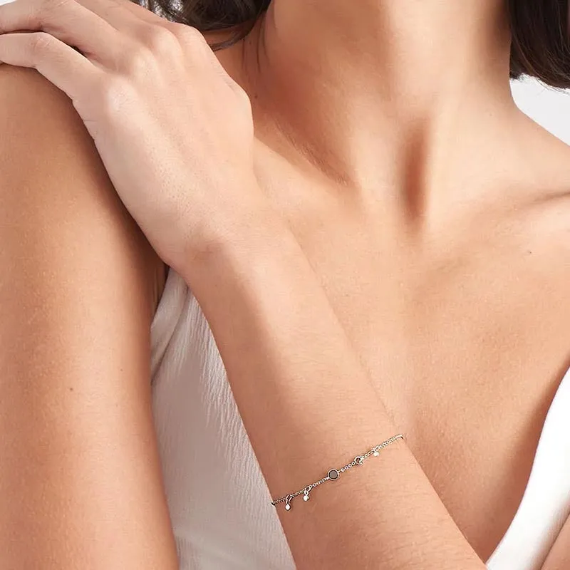 Geometry Drop Discs Sterling Silver Bracelet plated in Rhodium