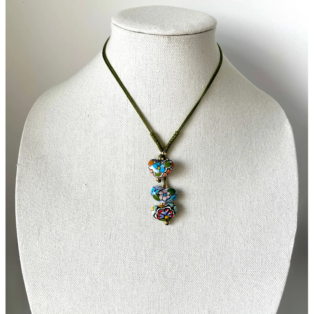 Handmade Triple Heart Shaped Necklace in Silky Green Cord from Puebla, Mexico.
