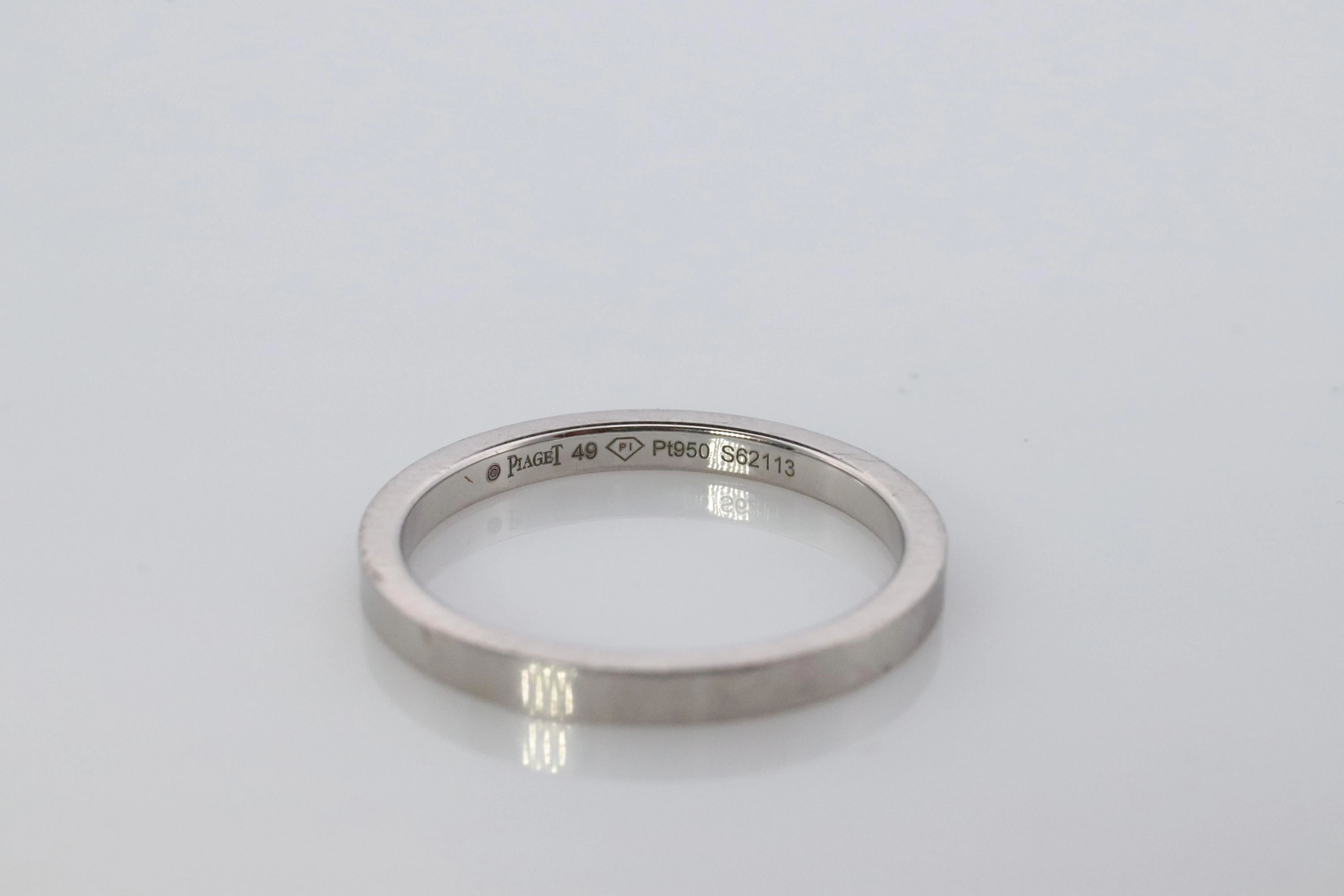 Piaget Ring. Genuine PIAGET PT950 Platinum Square Wedding Band.