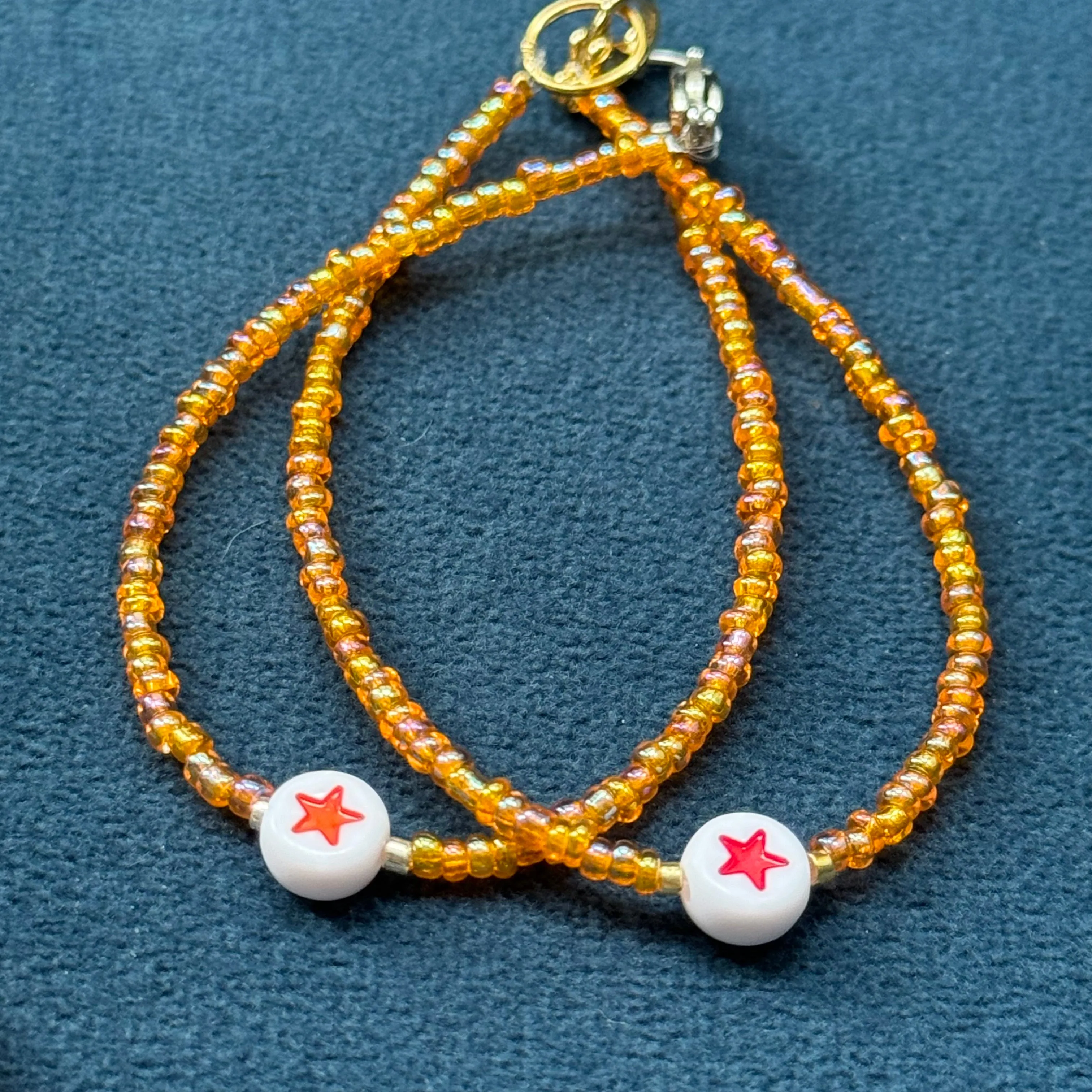 Shiny orange glass bead bracelets