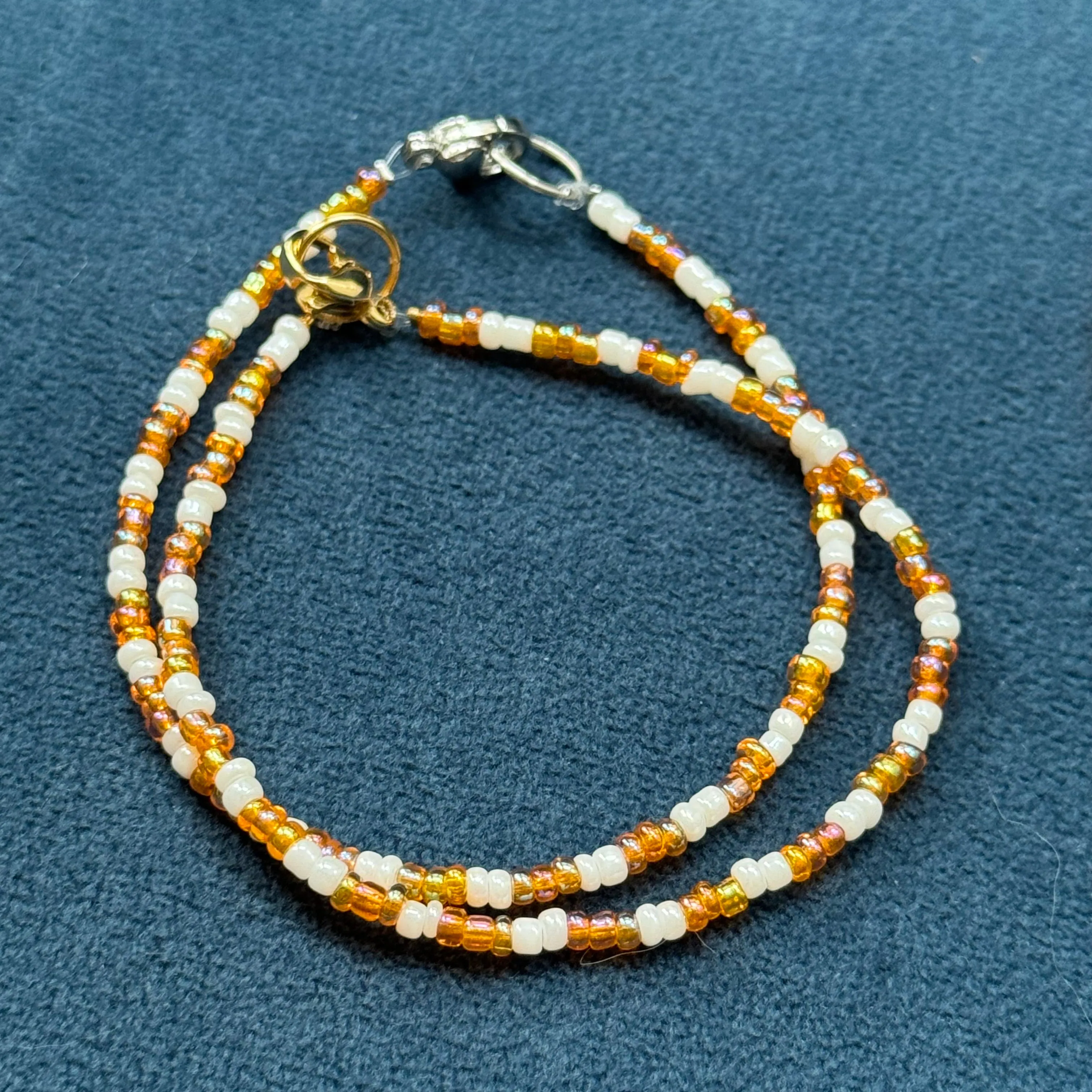 Shiny orange glass bead bracelets