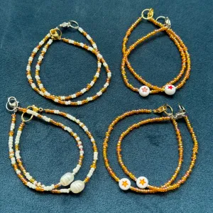 Shiny orange glass bead bracelets