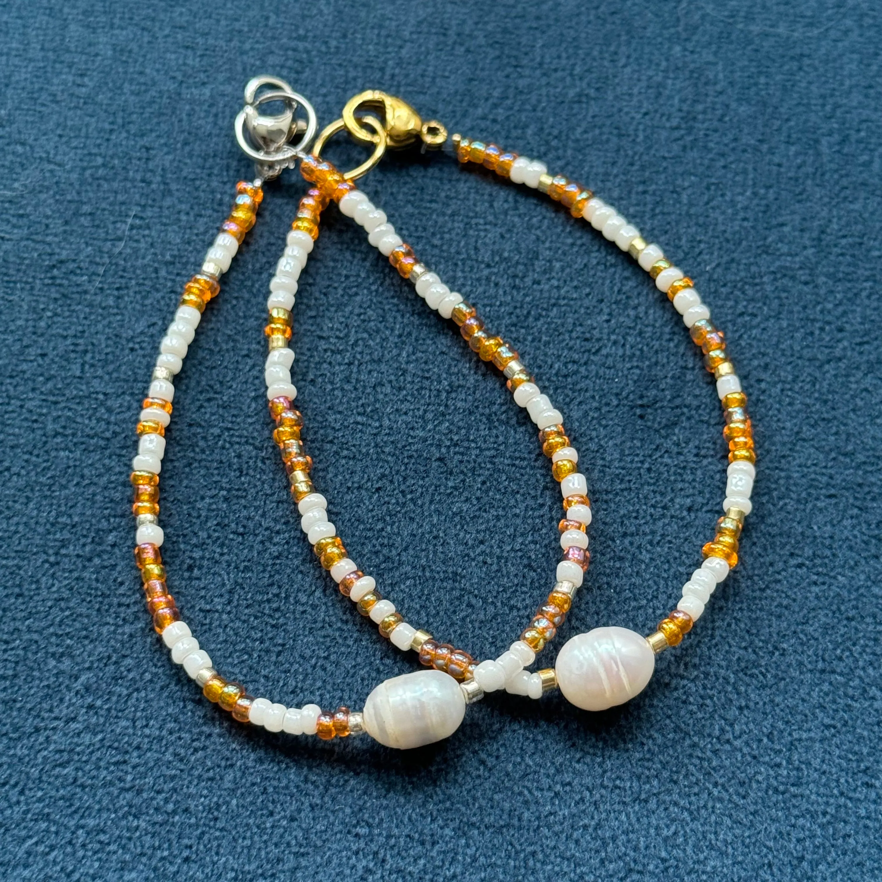 Shiny orange glass bead bracelets