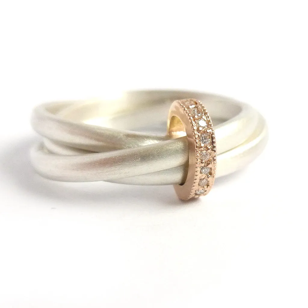 Silver, 18ct gold ring with 9 diamonds