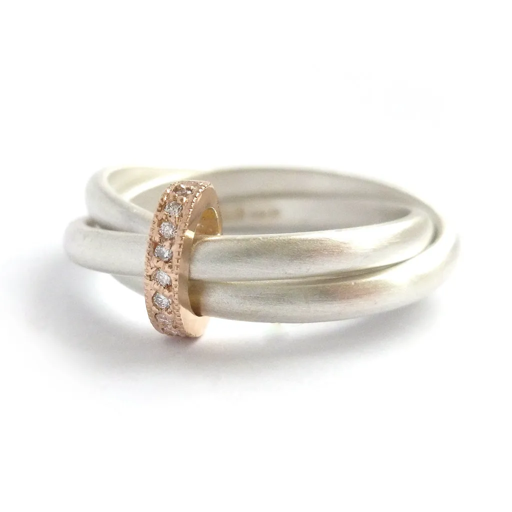 Silver, 18ct gold ring with 9 diamonds