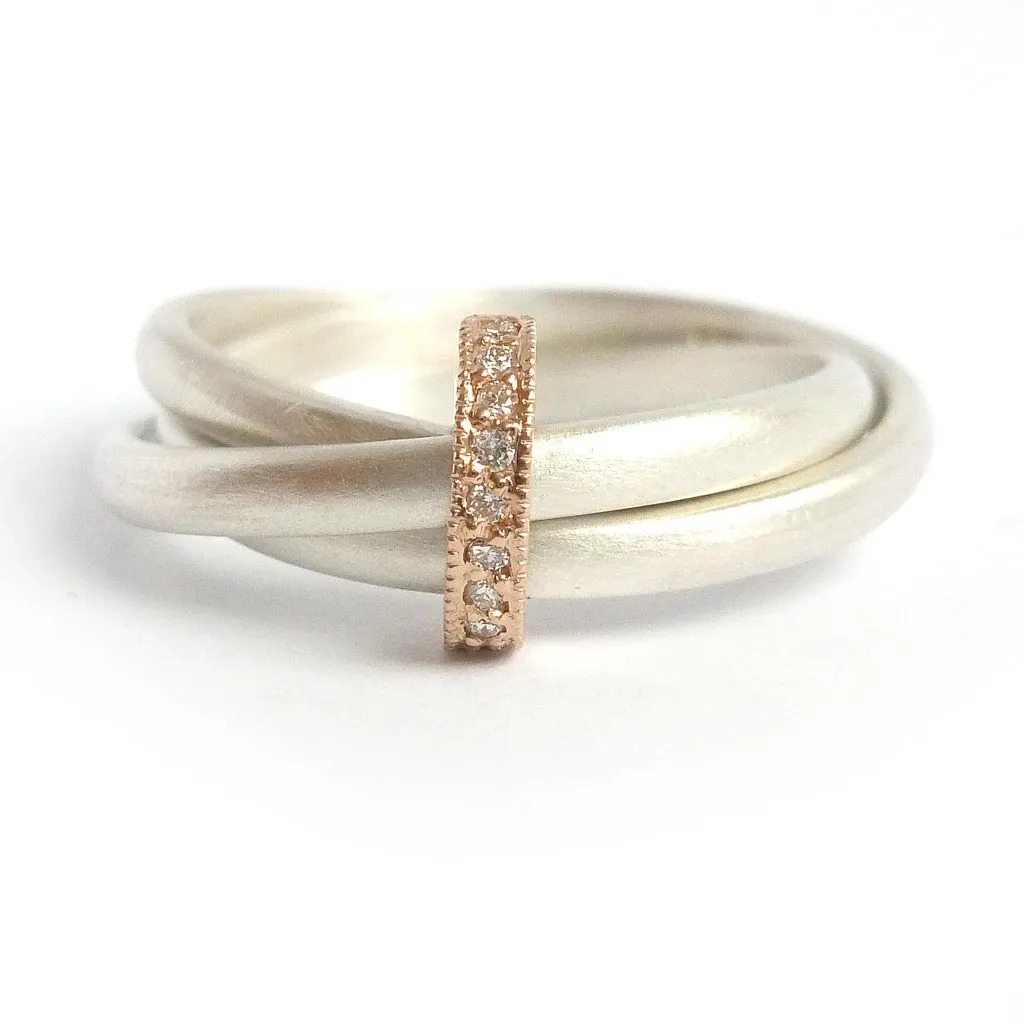 Silver, 18ct gold ring with 9 diamonds