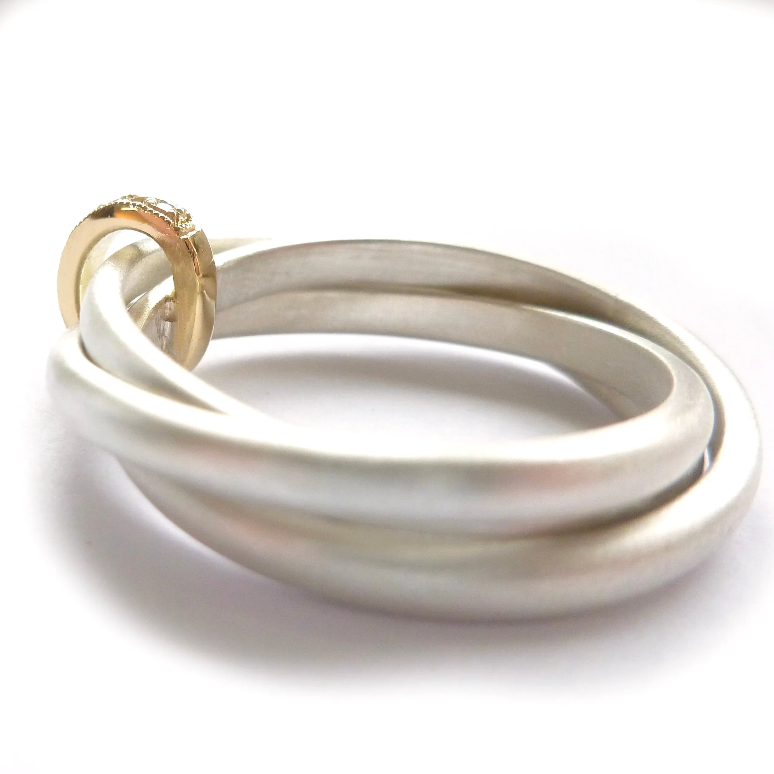 Silver, 18ct gold ring with 9 diamonds