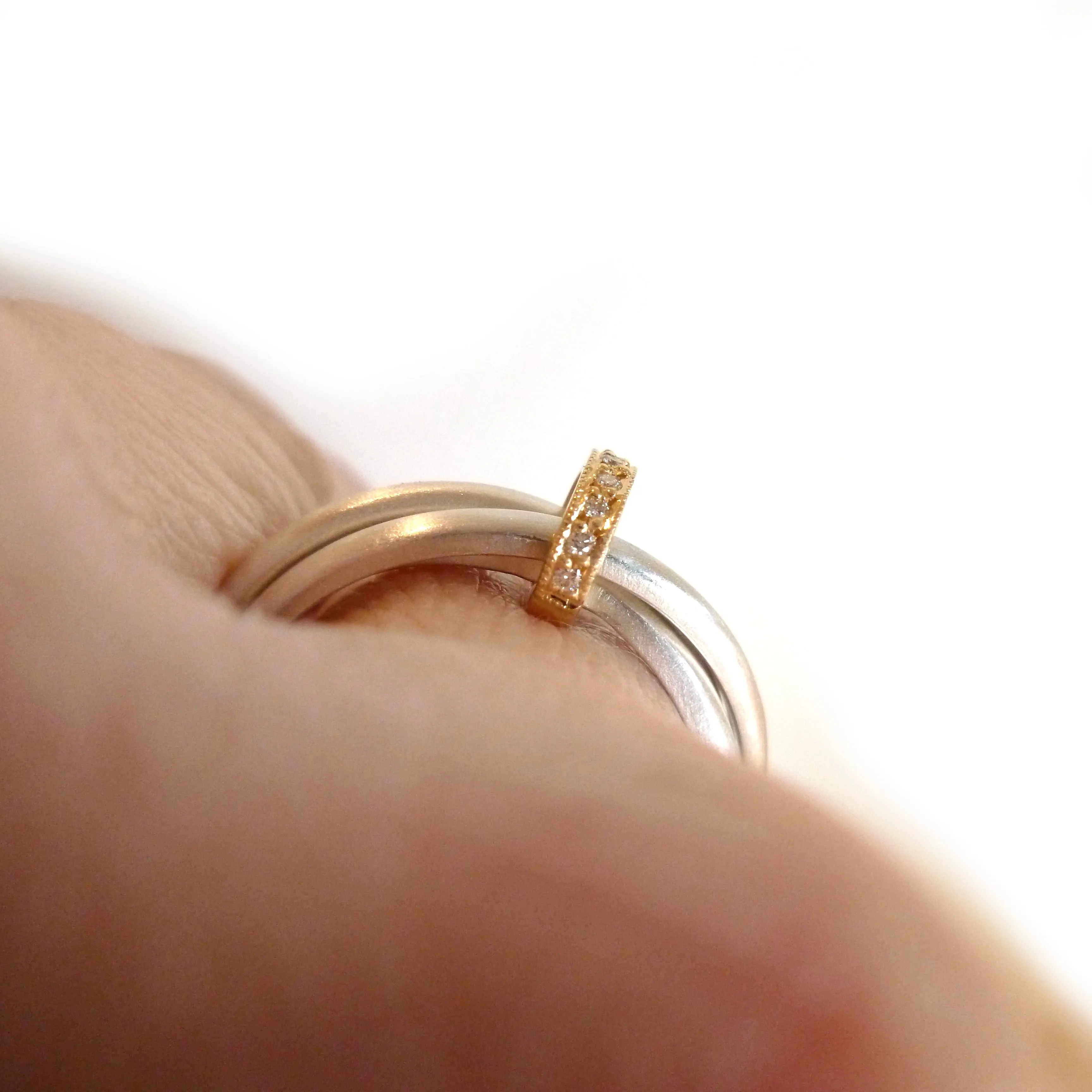 Silver, 18ct gold ring with 9 diamonds