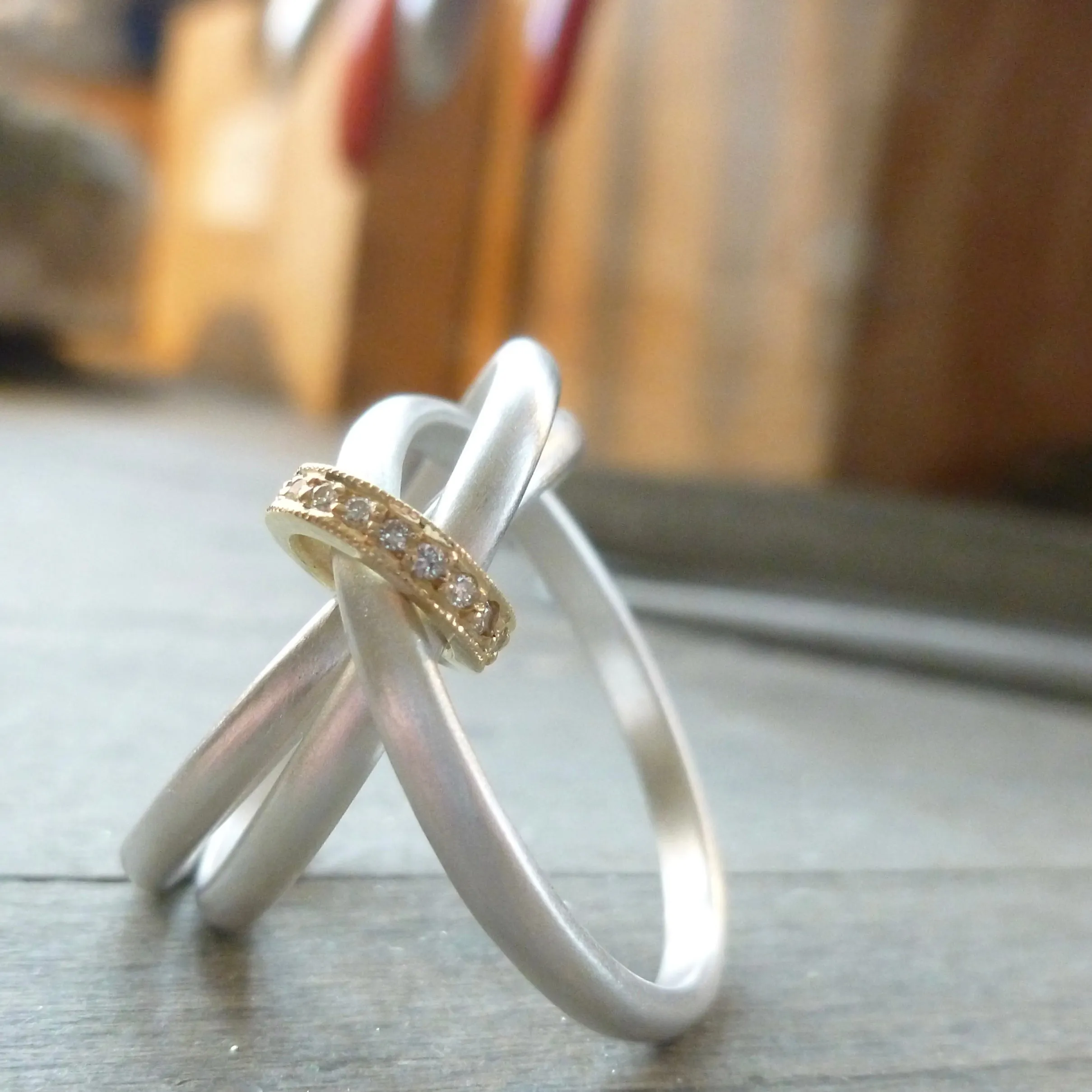 Silver, 18ct gold ring with 9 diamonds