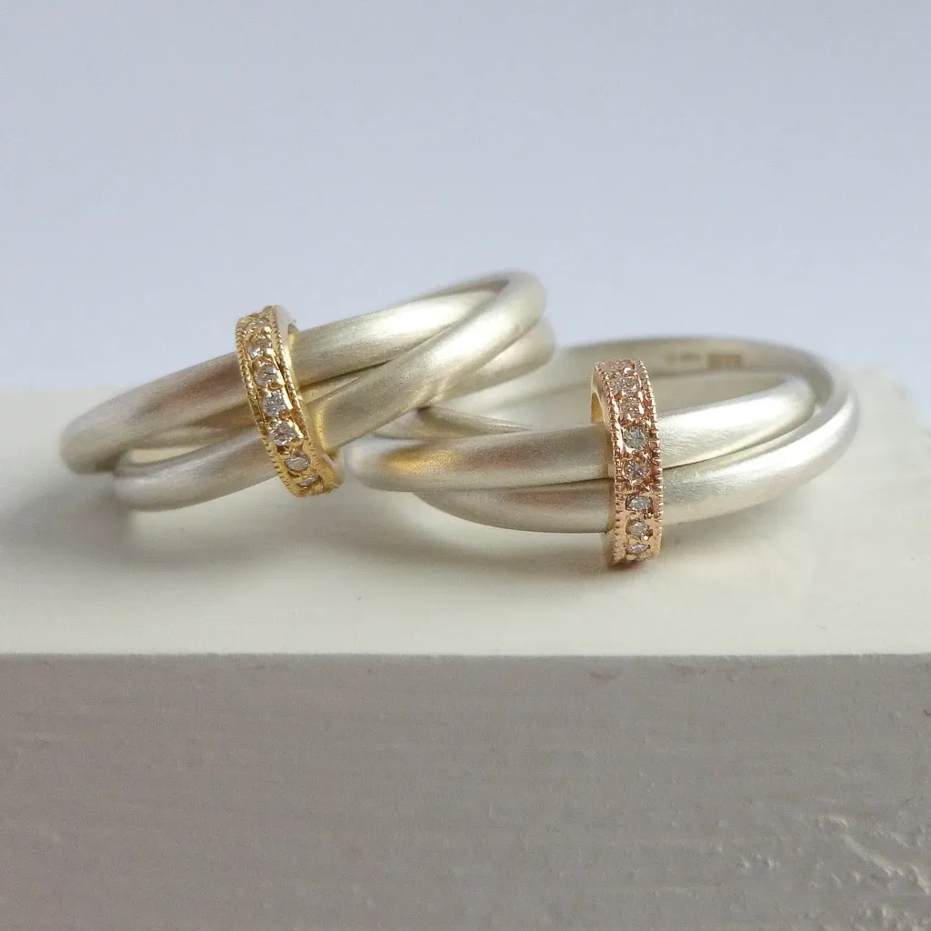 Silver, 18ct gold ring with 9 diamonds