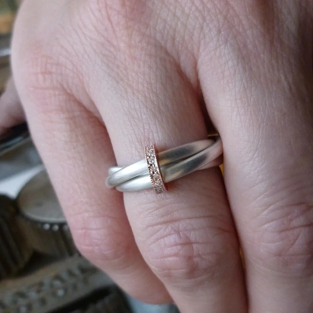 Silver, 18ct gold ring with 9 diamonds